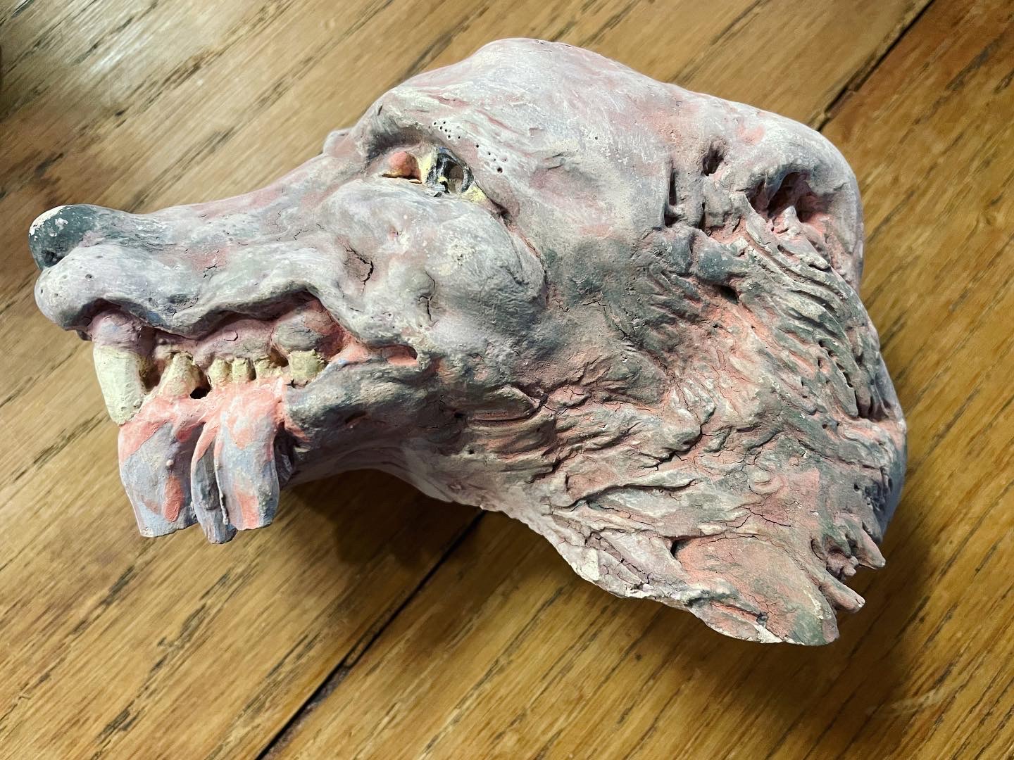 Patient art work for mental illness recovery workshop, wolf in ceramic clay