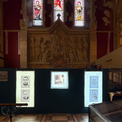 Display of artwork on chapel altar at Glenside Hospital Museum in Bristol